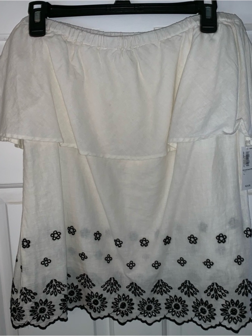 Off-Shoulder White Dress with Black Embroidered Hem